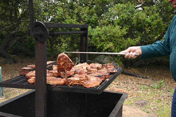 Santa Maria BBQ menu with several beef steaks on the grill